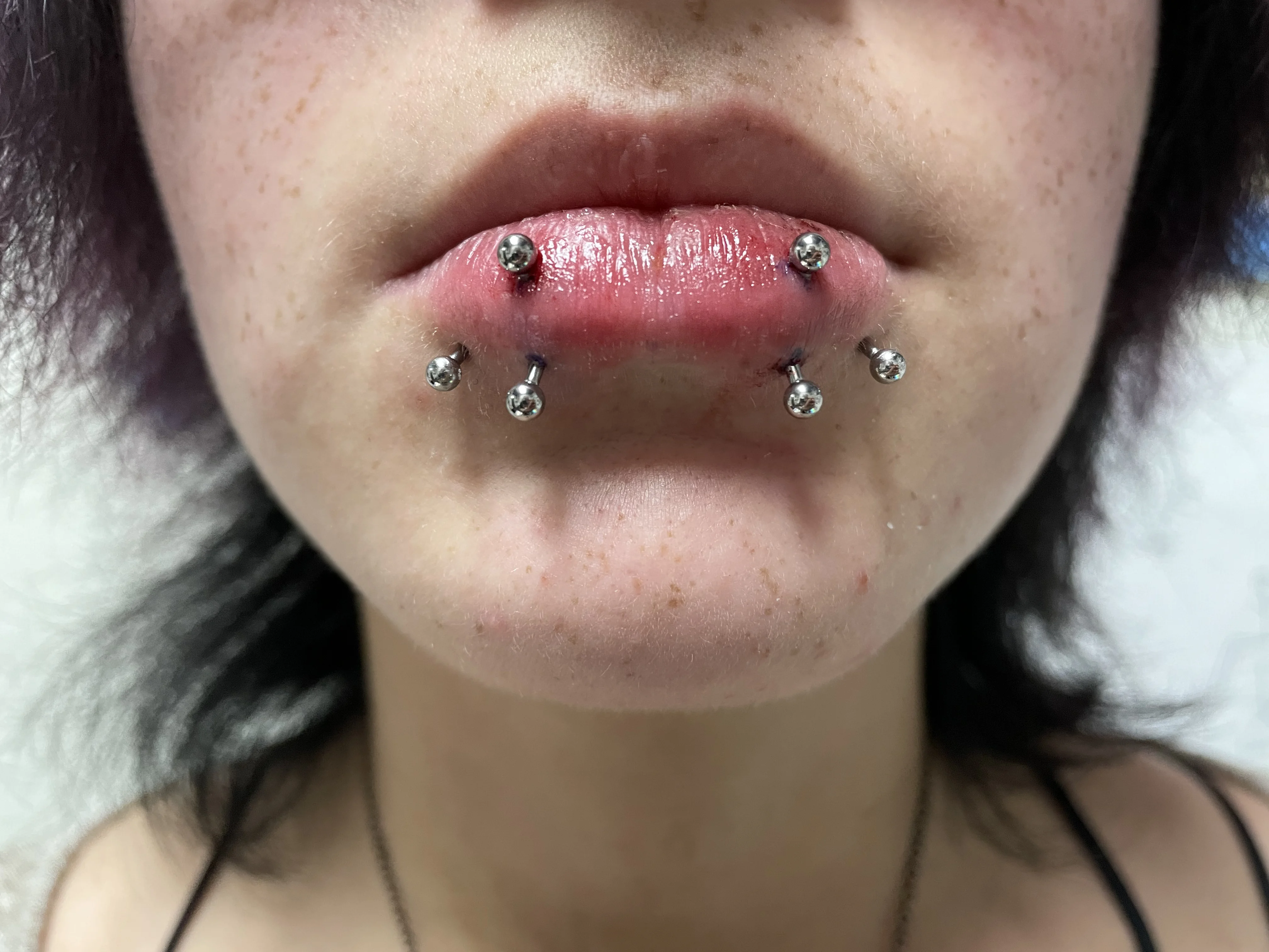 Snake bites and 2 vertical labrets — oral piercing